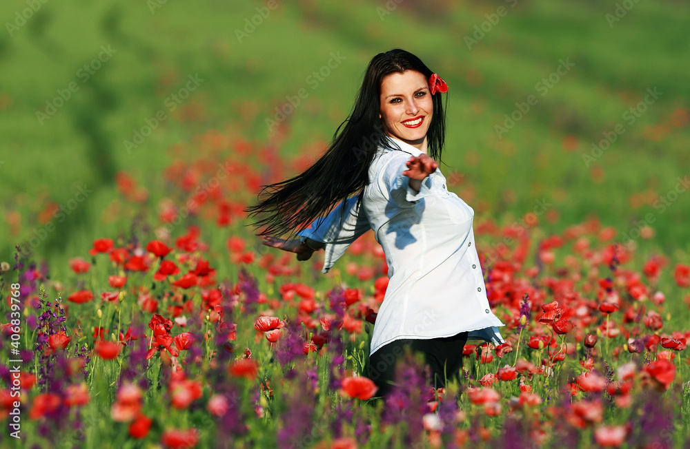 Young brunette beautiful gilrl enjoying the spring flowers Young brunette beautiful gilrl enjoying the spring flowers
