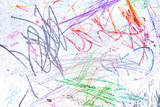 Children s chaotic drawings in colorful chalk on a white blackboard. Abstract pattern texture background
