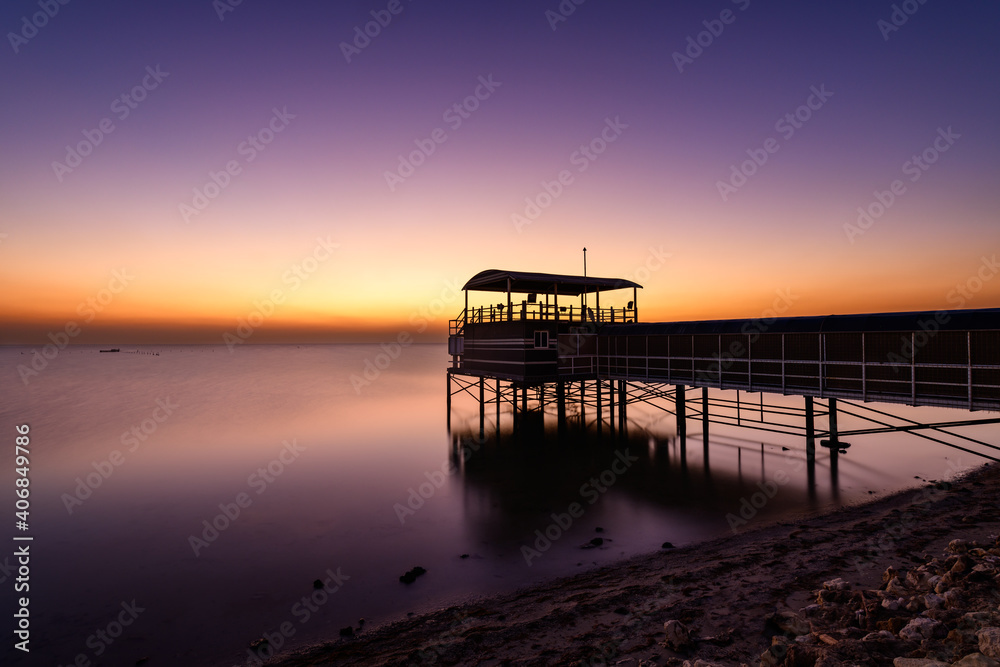 A beautiful view of Sea Bridge at Askar Fishing Harbor during sunrise at golden hour, Manama, Bahrain