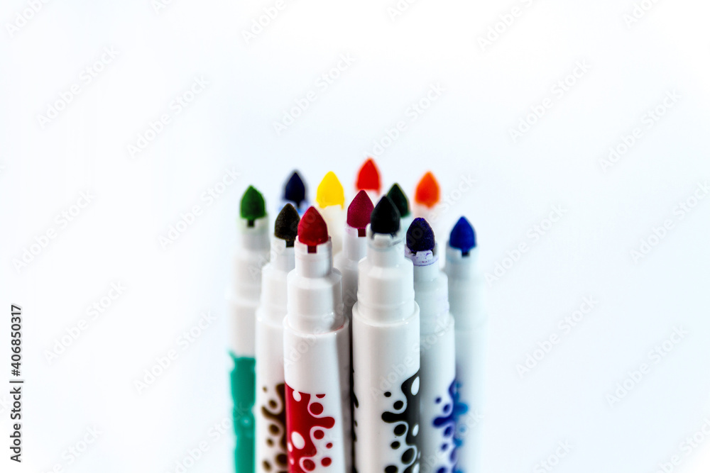 Children felt pens in 12 colors, isolated on white Children felt pens in 12 colors, isolated on white