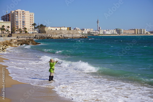 Pirate looking at sea with telescope