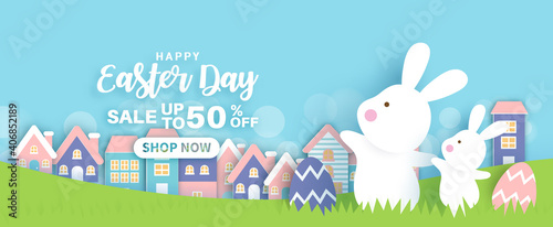Easter day background and banner with  cute rabbiits and easter eggs.