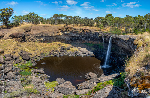 Panorama of scenic waterfall in Australian outback photo