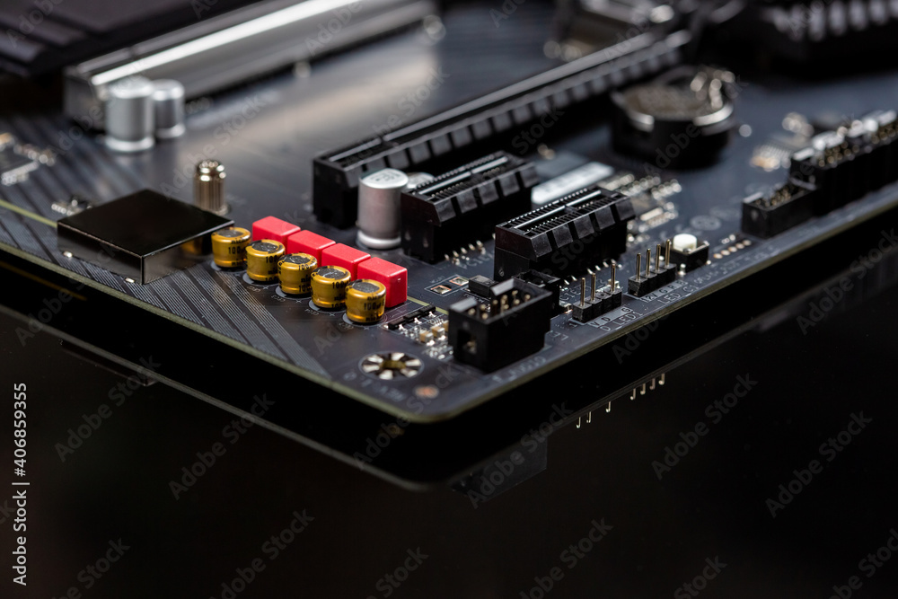 Motherboard on a table close-up, inside of a desktop computer, selective focus Motherboard on a table close-up, inside of a desktop computer, selective focus