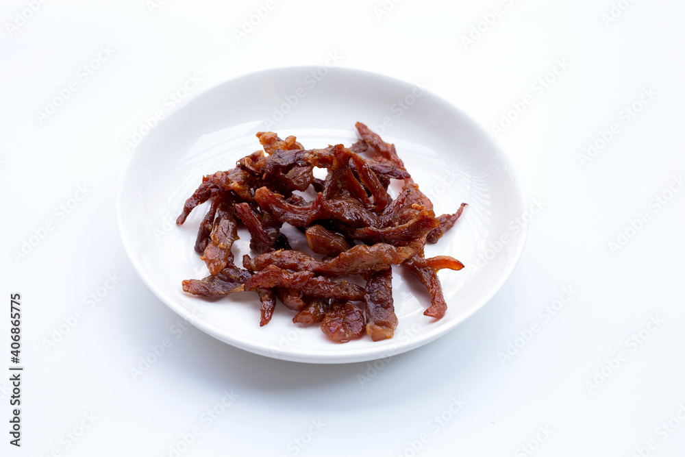Deep fried sun-dried pork on white background. Deep fried sun-dried pork on white background.