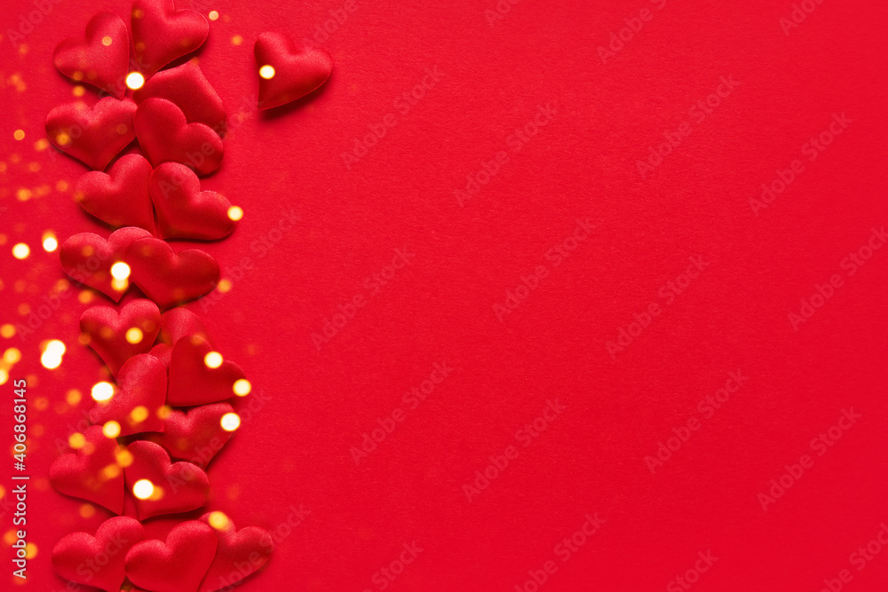 Valentines Day concept. Red hearts on a red background. Top view, copy space
