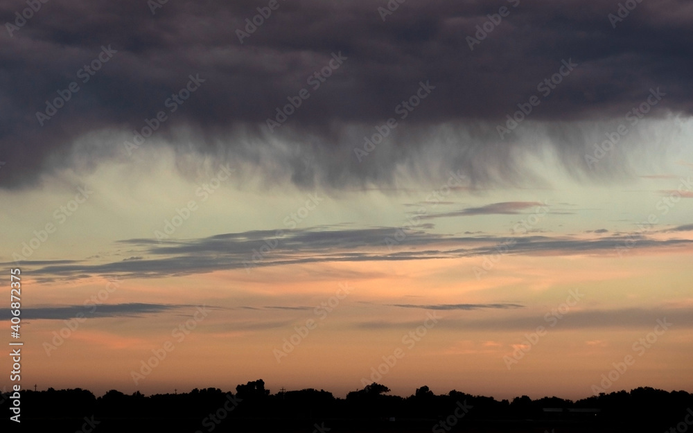 Sunrise or sunset large copy-space with the colors blue and orange predominating Sunrise or sunset large copy-space with the colors blue and orange predominating