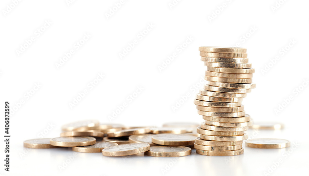 A pile of euro coins and scattered coins on a white background A pile of euro coins and scattered coins on a white background