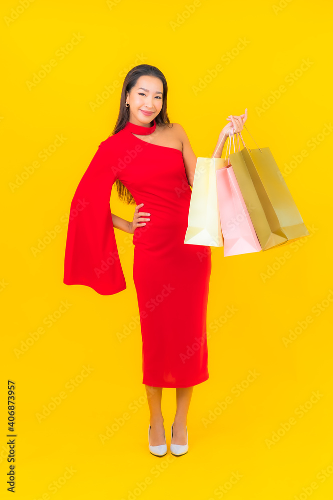 Portrait beautiful young asian woman with shopping bag and credit card