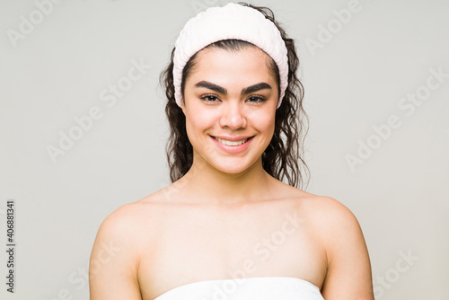 Fotografija Portrait of a young woman about to take a bath
