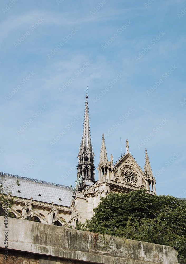 Notre Dame de Paris, view from the Seine River. Daylight and light clouds. Notre Dame de Paris, view from the Seine River. Daylight and light clouds.