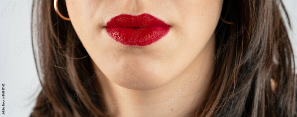Close-up lips of young beautiful woman. Sexy red lips. Lip Makeup. Glossy red lipstick. Panoramic shot. Close-up macro shot. High quality image. Panorama banner. Close-up lips of young beautiful woman. Sexy red lips. Lip Makeup. Glossy red lipstick. Panoramic shot. Close-up macro shot. High quality image. Panorama banner.