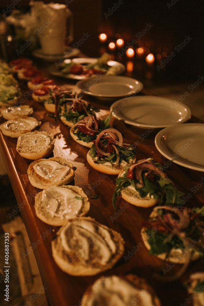 preparation of hamburgers for catering a social event.