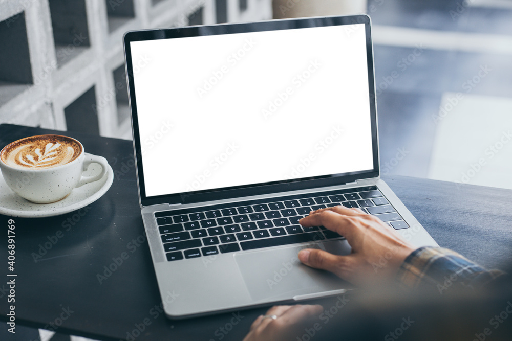 computer screen blank mockup.hand woman work using laptop with white background for advertising,contact business search information on desk at coffee shop.marketing and creative design computer screen blank mockup.hand woman work using laptop with white background for advertising,contact business search information on desk at coffee shop.marketing and creative design