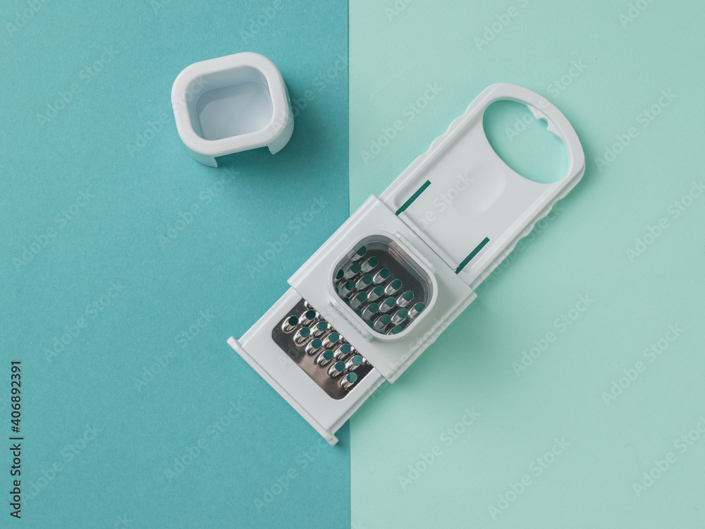 Special hand grater on a two-color background. Special hand grater on a two-color background.