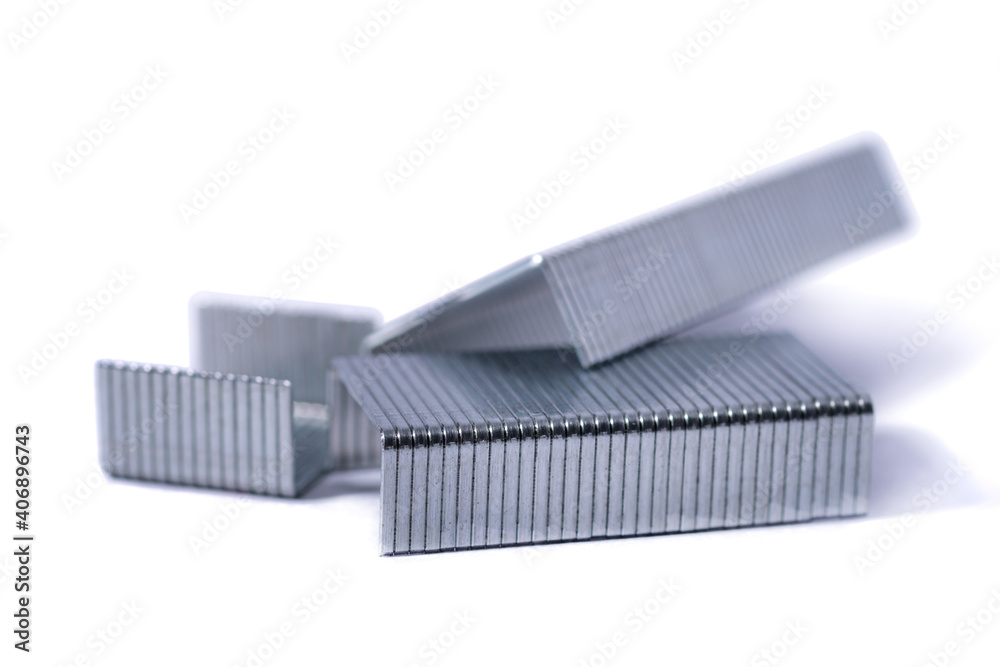 Blue stapler and staples Isolated on white background. Blue stapler and staples Isolated on white background.