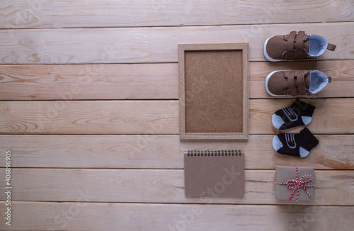 Baby accessories set on the wooden table.