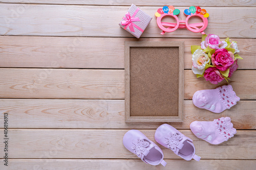 Baby accessories set on the wooden table.