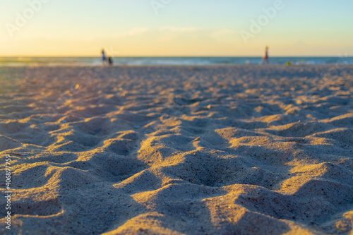 Closeup of sand on the beach at sunrise