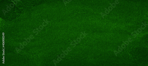 Navy green watercolor background with drips and spots. Frame with copy space.