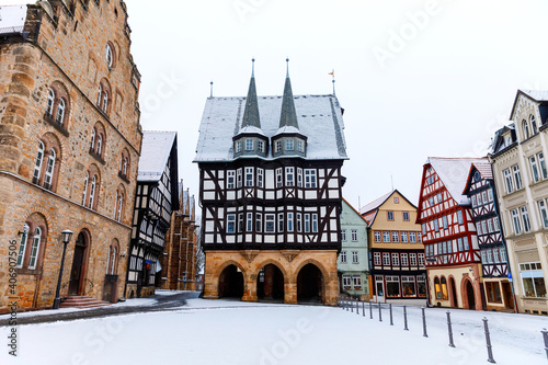 View of Alsfeld town hall  Weinhaus and church on main square  Germany. Historic city in Hesse  Vogelsberg  with old medieval frame half-timbered houses called Fachwerk or Fachwerhaus in German.
