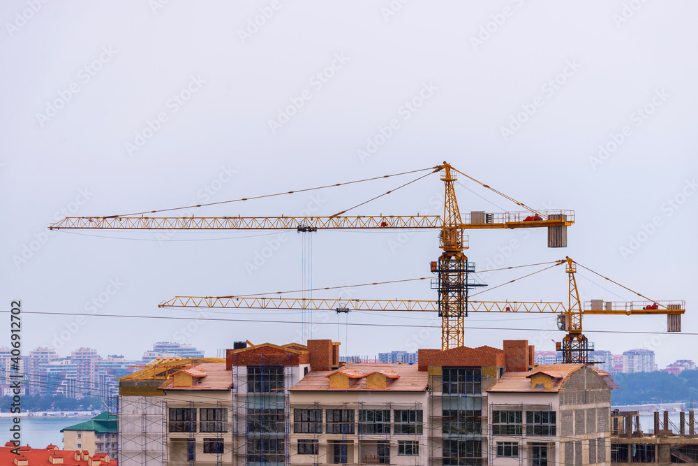 Construction tower crane on construction site