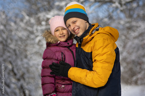 Two children on a walk in winter