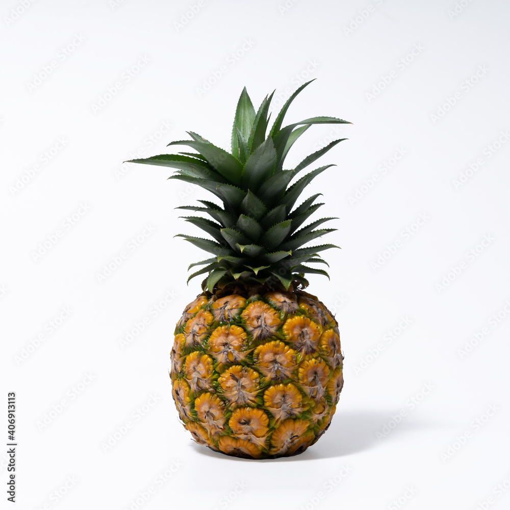 Fototapeta premium Whole fresh pineapple fruit on white background