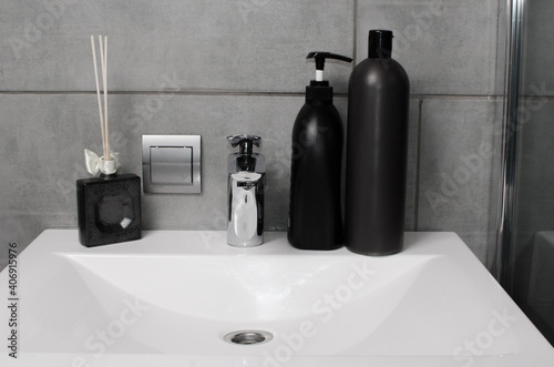 Bathroom interior with sink and faucet. Modern bathroom corner. Home interior, modern bathroom in apartment.