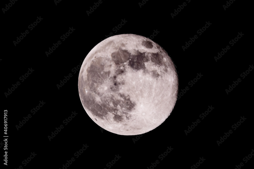 Full moon in a black sky. Astronomy concept Full moon in a black sky. Astronomy concept