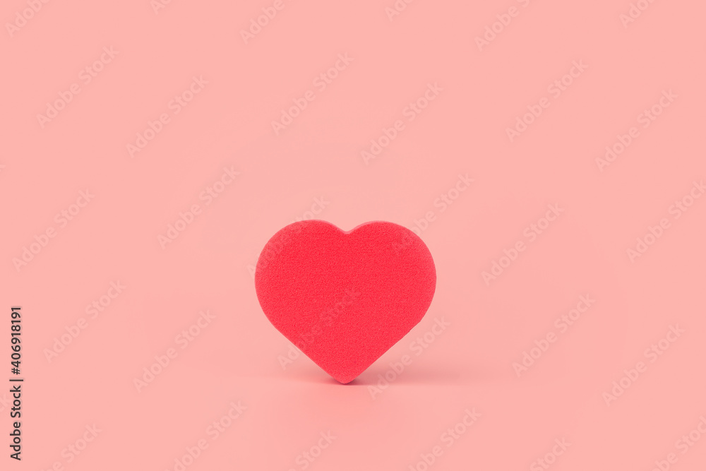 Heart on a colored background. Donation, charity, health treatment, help concept. Background for Valentine's Day (February 14) and love..