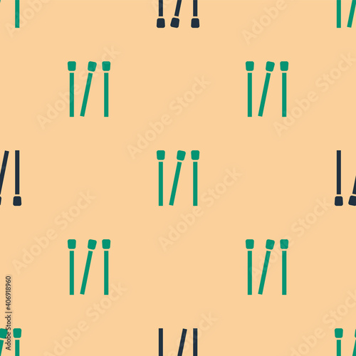 Green and black Matches icon isolated seamless pattern on beige background. Vector.