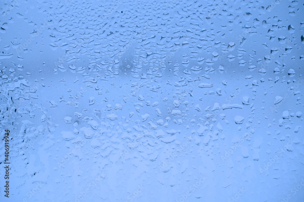 Abstract blue background. Sweaty glass texture. Macro.