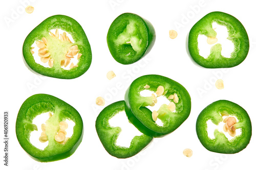 sliced jalapeno peppers isolated on white background. Green chili pepper. Capsicum annuum. top view