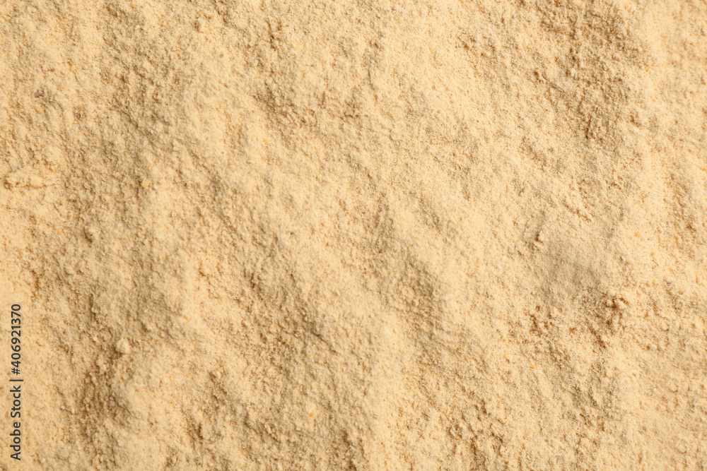Dry powdered ginger as background, top view Dry powdered ginger as background, top view