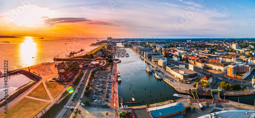 Sunset in Bremerhaven with houses and ships	