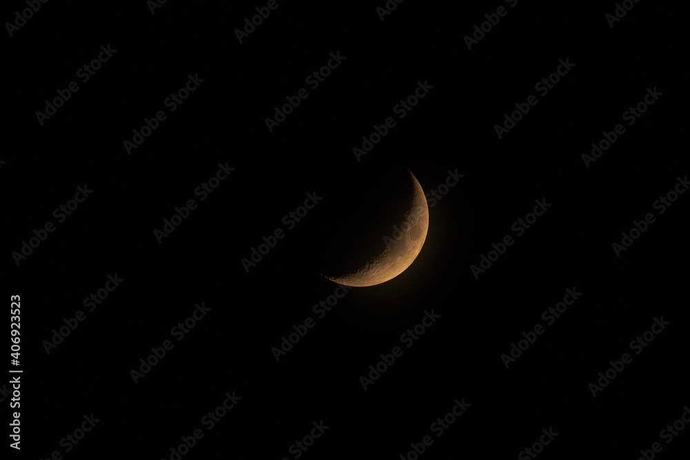 Young Moon photographed through a long focal telescope.