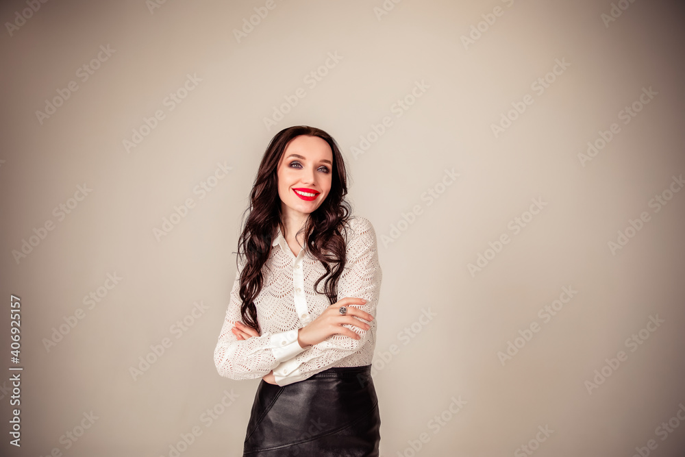portrait of a beautiful young brunette with long hair. businesswoman portrait of a beautiful young brunette with long hair. businesswoman
