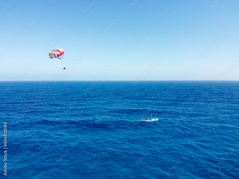 Drone photo of parasail at Playa Ballenas, Cancun, Mexico Drone photo of parasail at Playa Ballenas, Cancun, Mexico