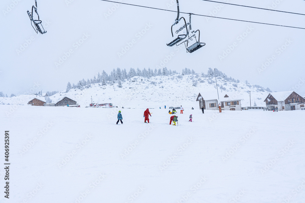 Auron, FRANCE - 01.01.2021: Empty ski slopes and ski lifts in ski resort. During the winter holidays 2021 January lifts are closed for skiing for adults due to the coronavirus pandemic. Auron, FRANCE - 01.01.2021: Empty ski slopes and ski lifts in ski resort. During the winter holidays 2021 January lifts are closed for skiing for adults due to the coronavirus pandemic.