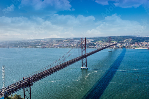 The 25 de Abril Bridge is a bridge connecting the city of Lisbon to the municipality of Almada, Portugal