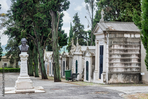 Crypts and details of the family tombs on the old city cemetery Cemiterio dos Prazeres in Lisbon, Portugal