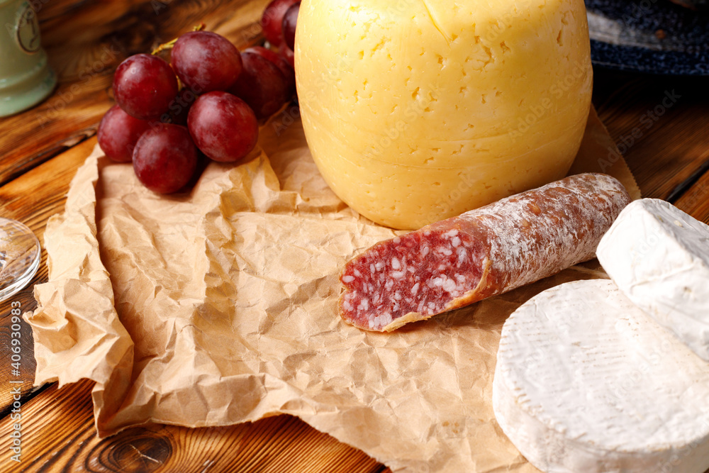 Head of cheese on brown wooden table Head of cheese on brown wooden table