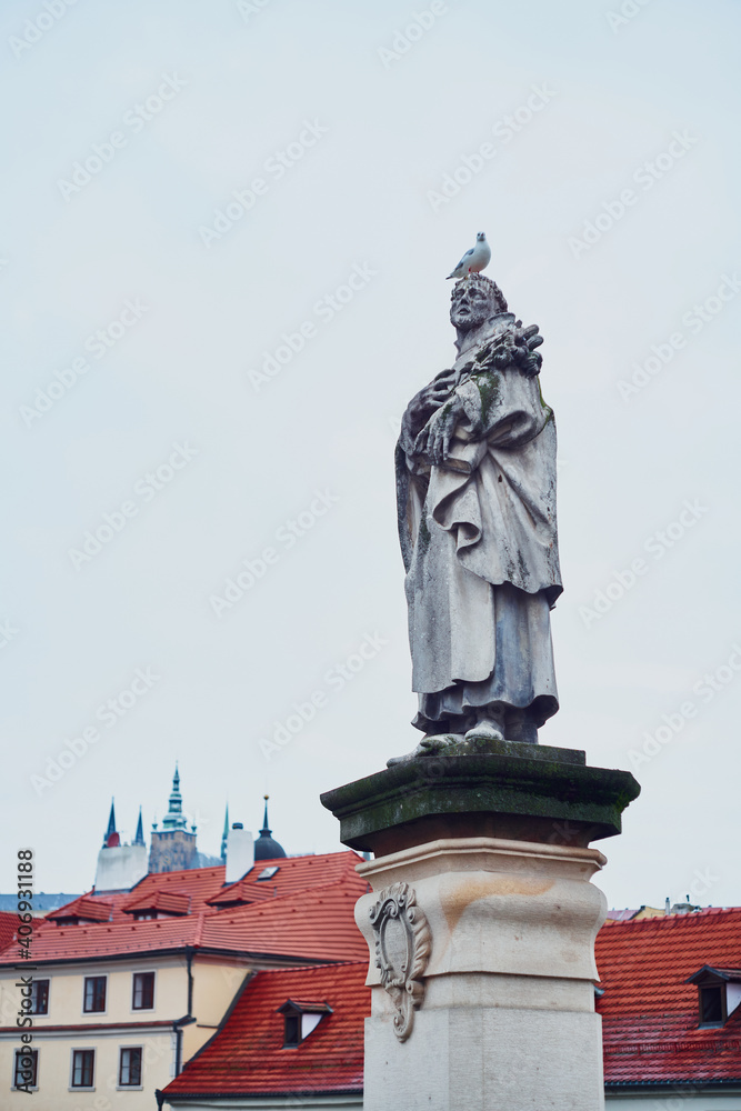 Prague, Czech Republic - January 7 2021: Stone statues in the  historical centre of Prague                                                       