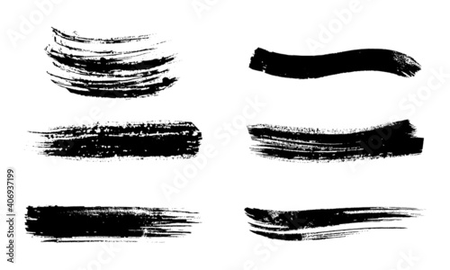 set of black ink strokes on white paper. Graphic design elements for lower third, text effect, photo pverlay, etc. Chinese style abstract brush strokes