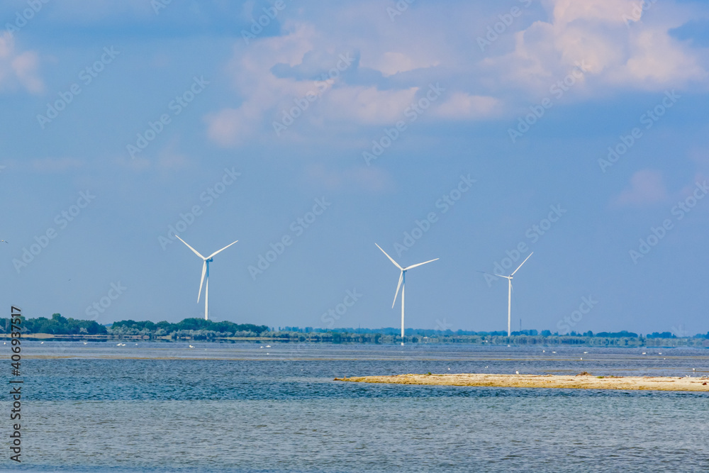 Wind turbines at the seashore. Clean energy. Ecological concept