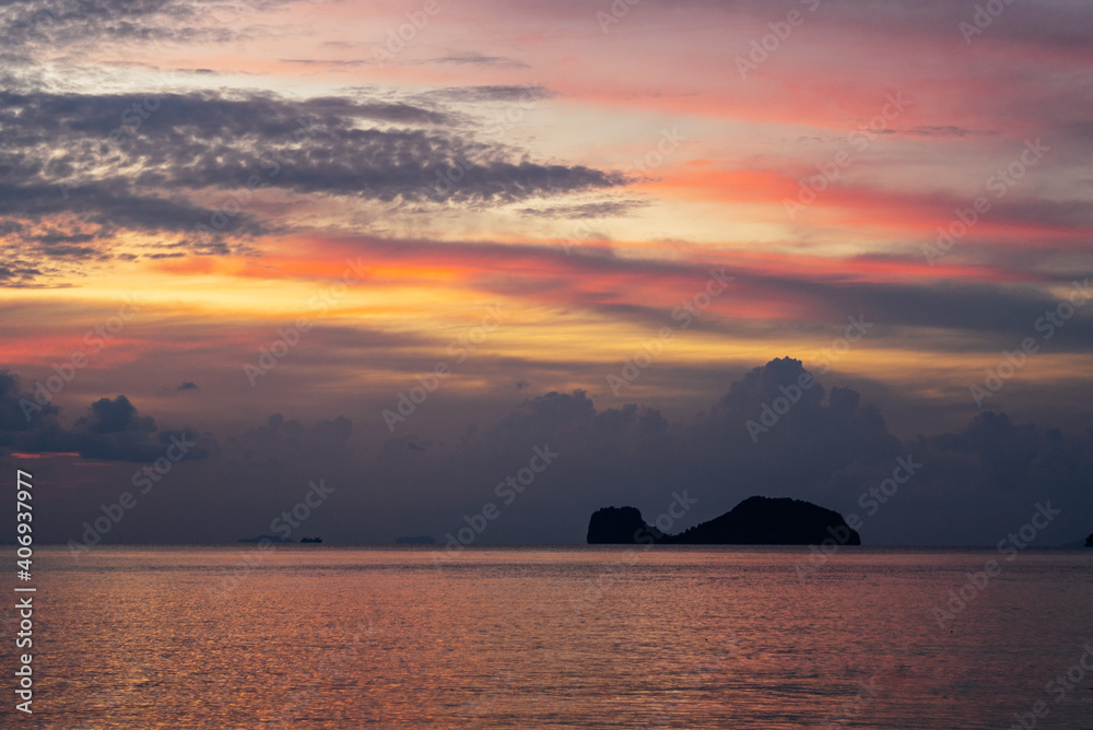 Sunset over the ocean orange sky in twilight time Sunset over the ocean orange sky in twilight time