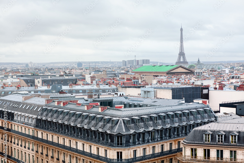 Paris City Panorama . View of Eiffel Tower and rooftops