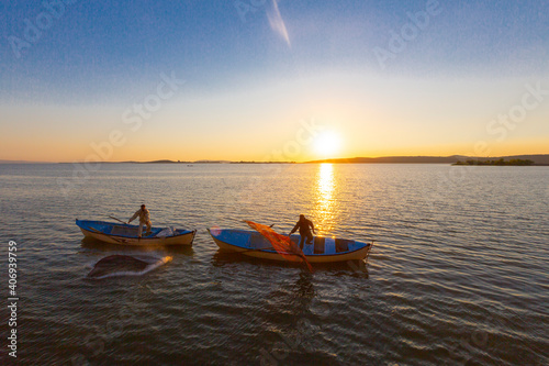 Net fishermen and the sunset / ulubat Lake photo