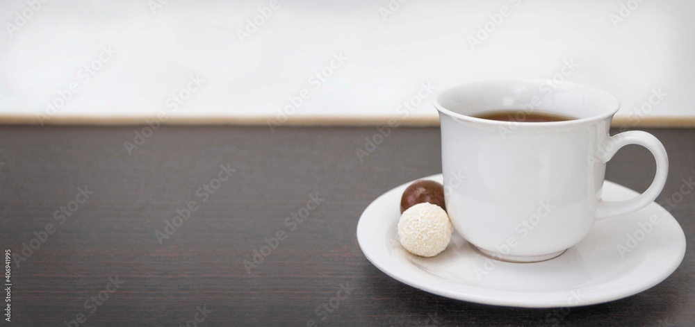 cup of coffee on wooden table cup of coffee on wooden table